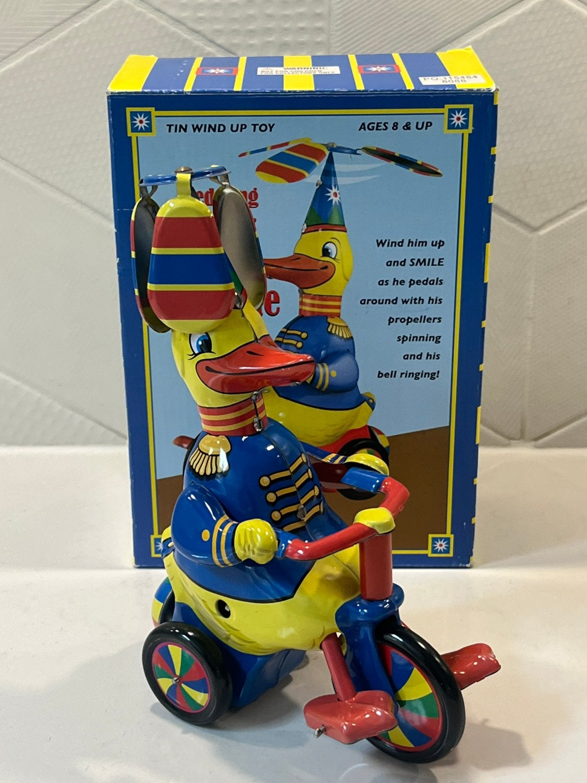Pedaling Duck on Tricycle blikken opwind speelgoed met doos, Verzenden
