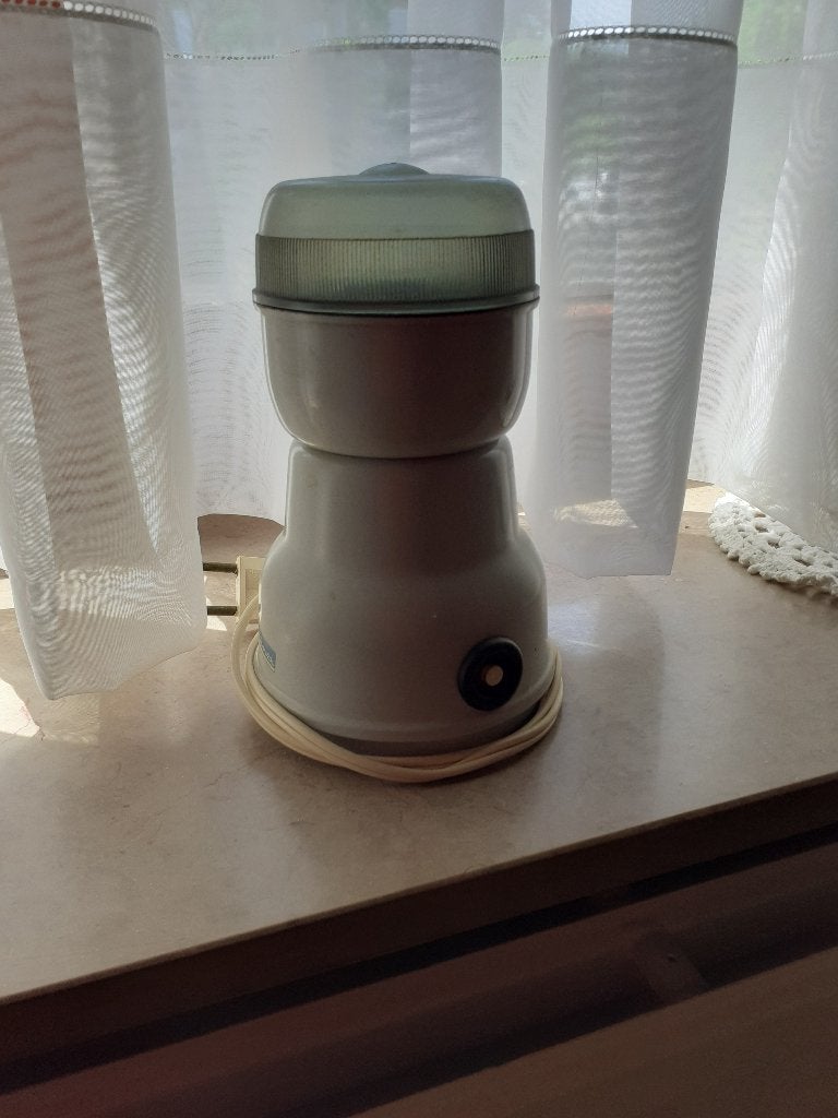 Elektrische koffiemolen Moulinex, Ophalen