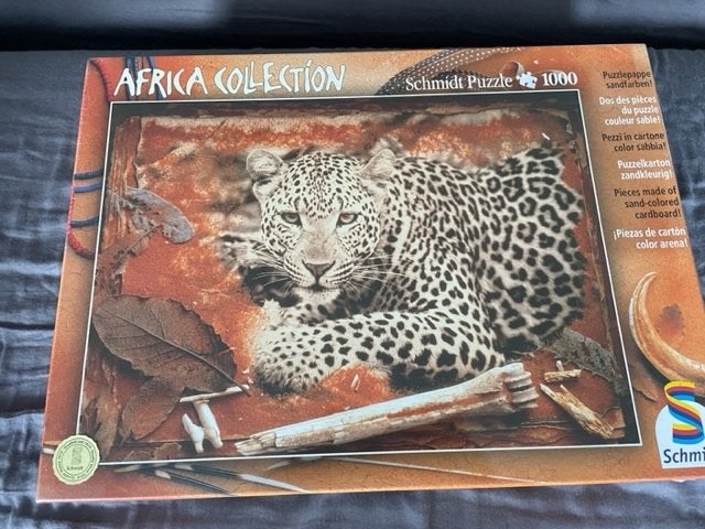 Te koop: panter puzzel 1000 stukjes nieuw in doos met folie, Ophalen of Verzenden, 500 t/m 1500 stukjes, Nieuw, Legpuzzel