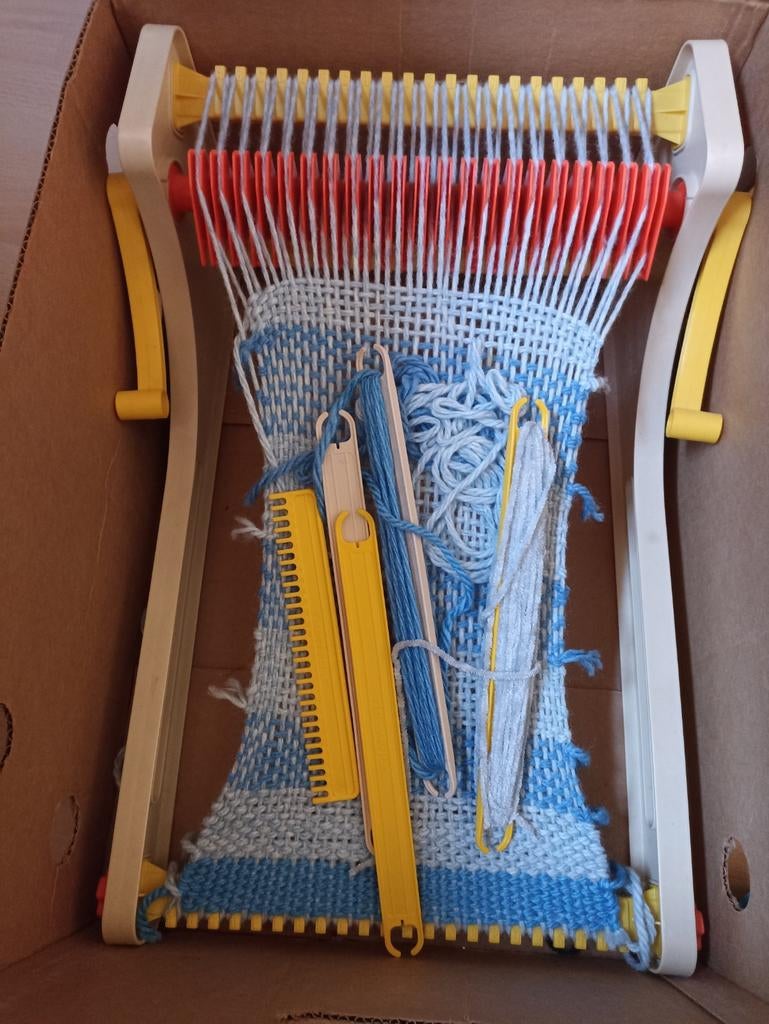 Fisher Price weefraam, Ophalen