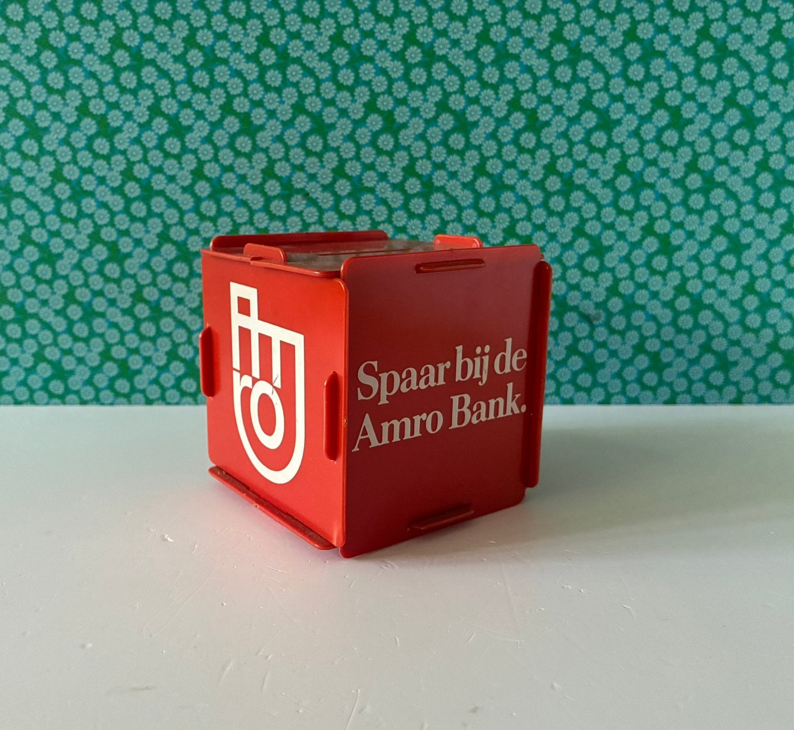 Vintage spaarpot Amro Bank, Verzamelen, Kunststof, Gebruikt, Ophalen of Verzenden, Overige thema's