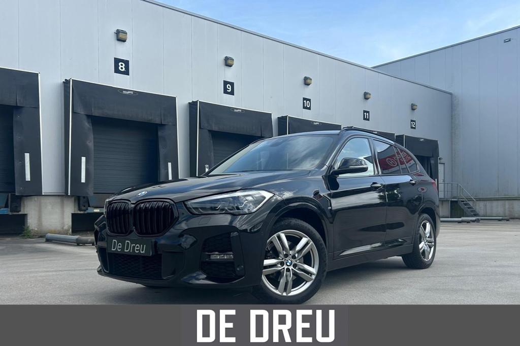 BMW X1 SDrive18i High Executive | M-SPORT | SHADOWLINE | EL, Auto's, 136 pk, Gebruikt, Leder en Stof, Zwart