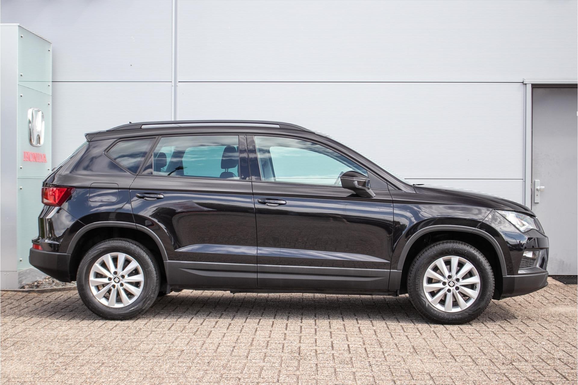 SEAT Ateca 1.0 EcoTSI Reference | Clima | Cruise control | C, Auto's, Voorwielaandrijving, Stof, Gebruikt, Zwart