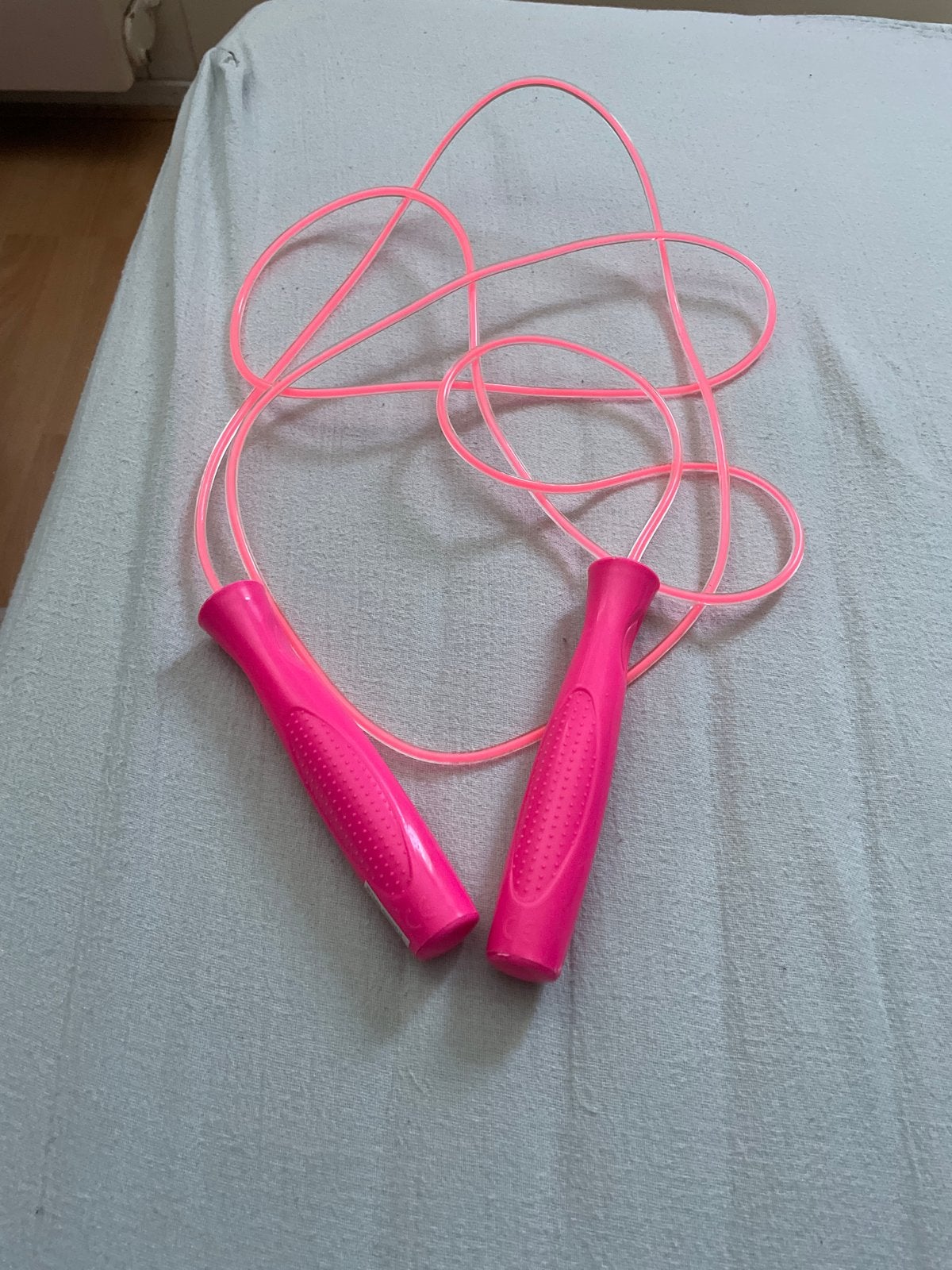 Roze springtouw - Zo goed als nieuw, Sport en Fitness, Ophalen of Verzenden, Sport-springtouw, Zo goed als nieuw