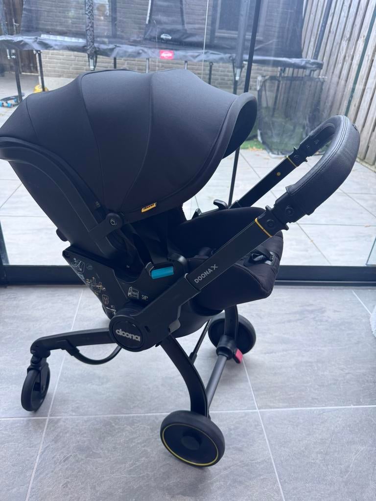 Doona X inclusief isofix + voetenzak, Kinderen en Baby's, Buggy's, Ophalen, Zo goed als nieuw, Regenhoes