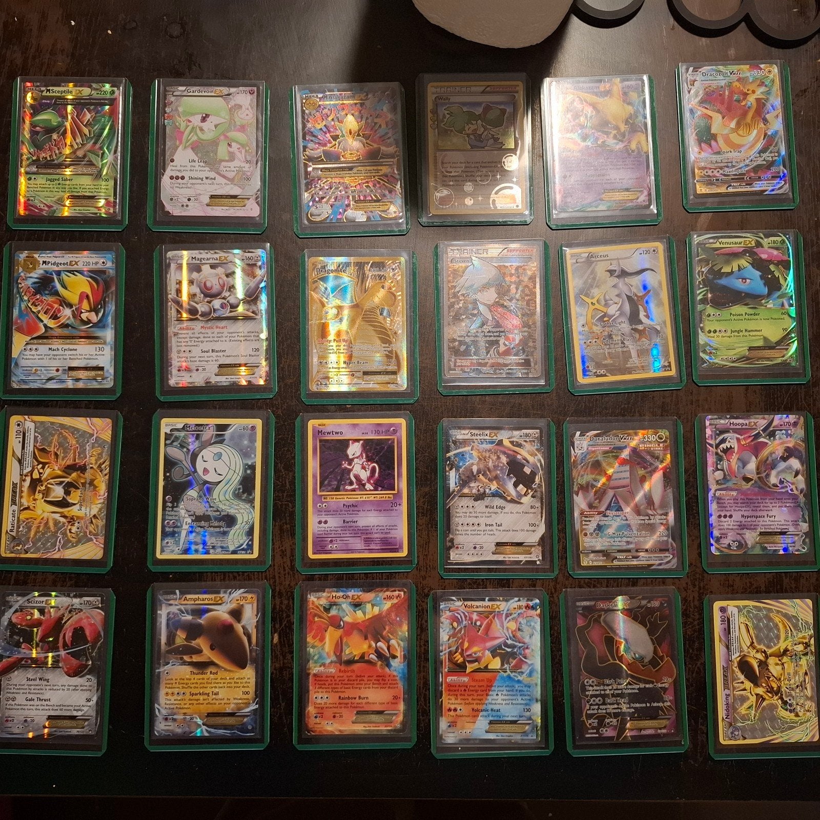 Pokémon Card Collection - 24 Cards, Ophalen of Verzenden, Zo goed als nieuw, Meerdere kaarten, Foil