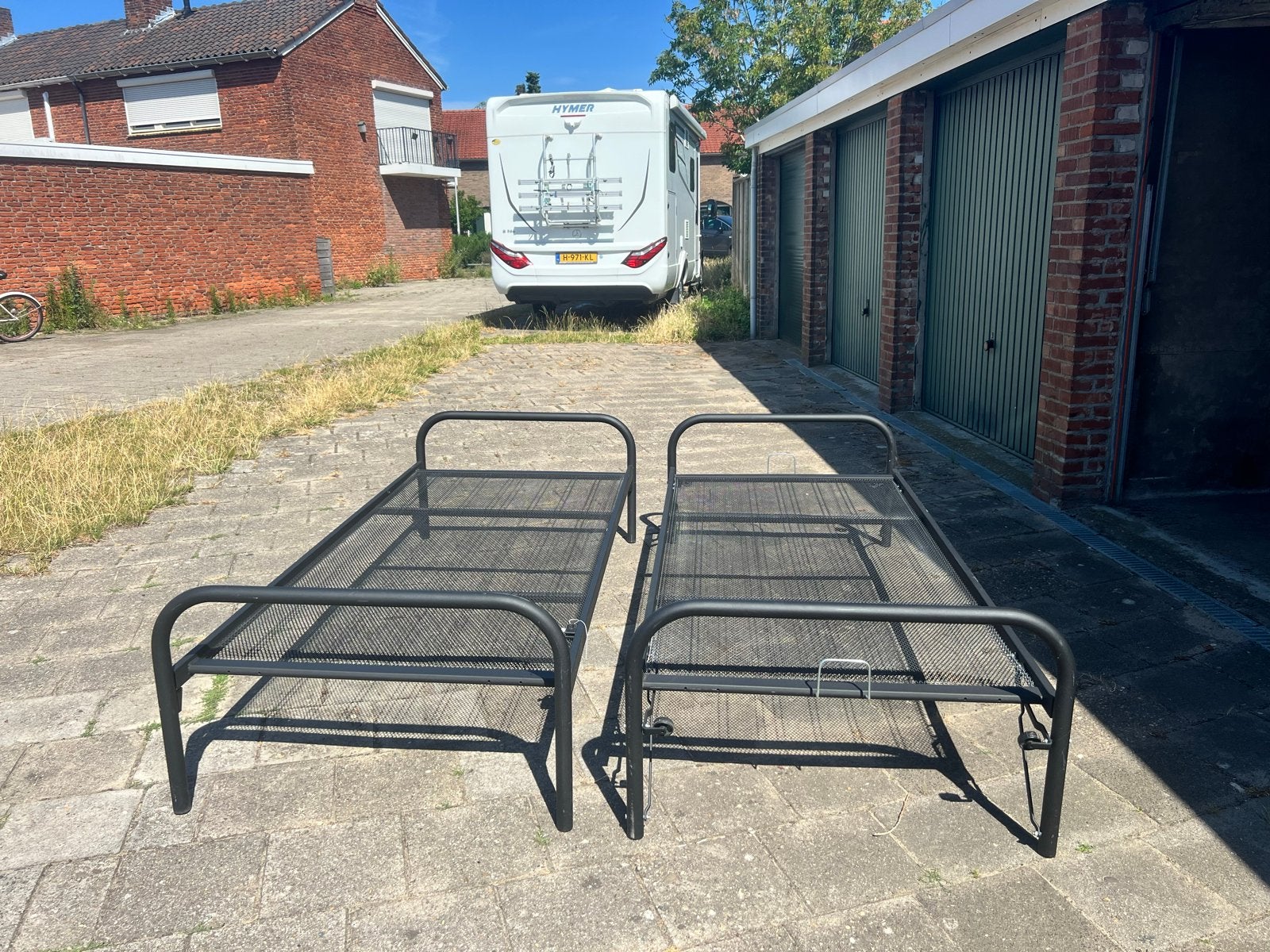 Uitschuifbaar logeerbed / onderschuifbed - Zwart metaal, Huis en Inrichting, Slaapkamer | Bedden, Ophalen, Gebruikt, 90 cm, Eenpersoons