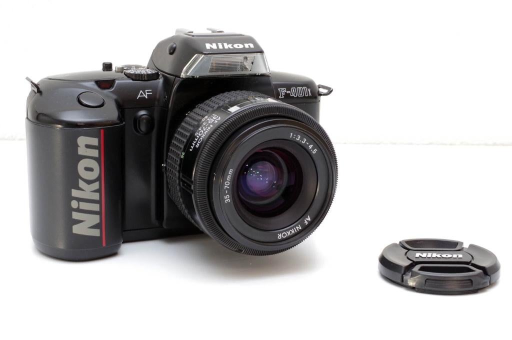 Nikon F-401x film F-mount SLR + Nikon 35-70mm zoomlens + bat, Audio, Tv en Foto, Fotocamera's Analoog, Verzenden, Refurbished