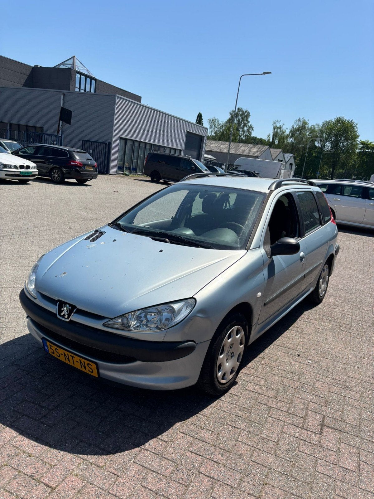 Peugeot 206 1.4 SW XS 2004 Grijs, Auto's, Voorwielaandrijving, 4 cilinders, Origineel Nederlands, Handgeschakeld