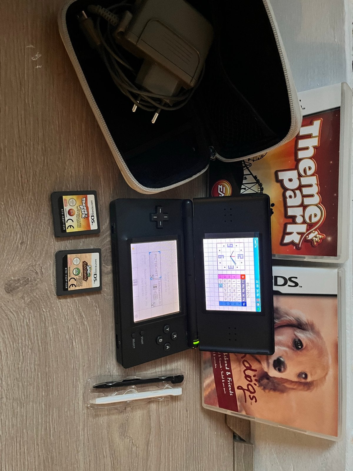 Nintendo DS Lite Zwart met spellen en hoes, Spelcomputers en Games, Spelcomputers | Nintendo DS, Ophalen, Zwart, DS Lite, Gebruikt