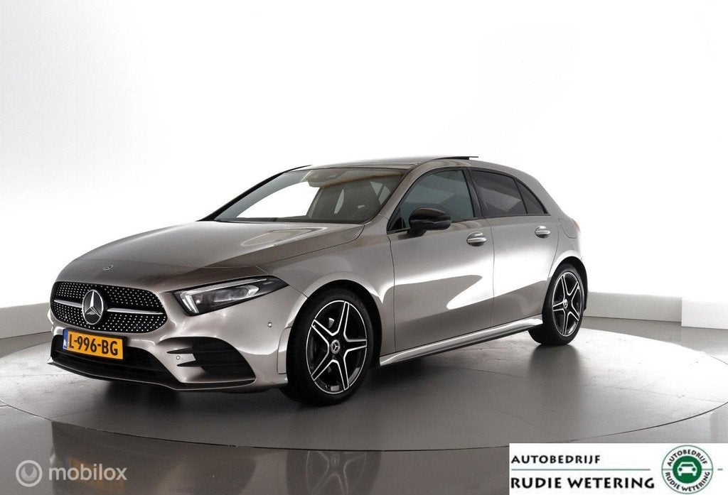 Mercedes A-klasse 180 Automaat Business Solution AMG pano|le, 136 pk, Gebruikt, 4 cilinders, Met garantie (alle)