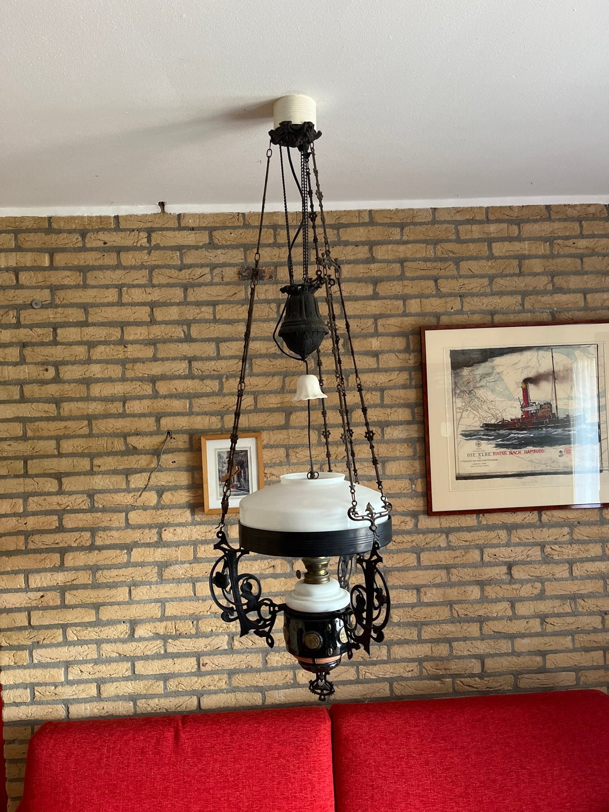 Antieke hanglamp met katrolsysteem, Ophalen