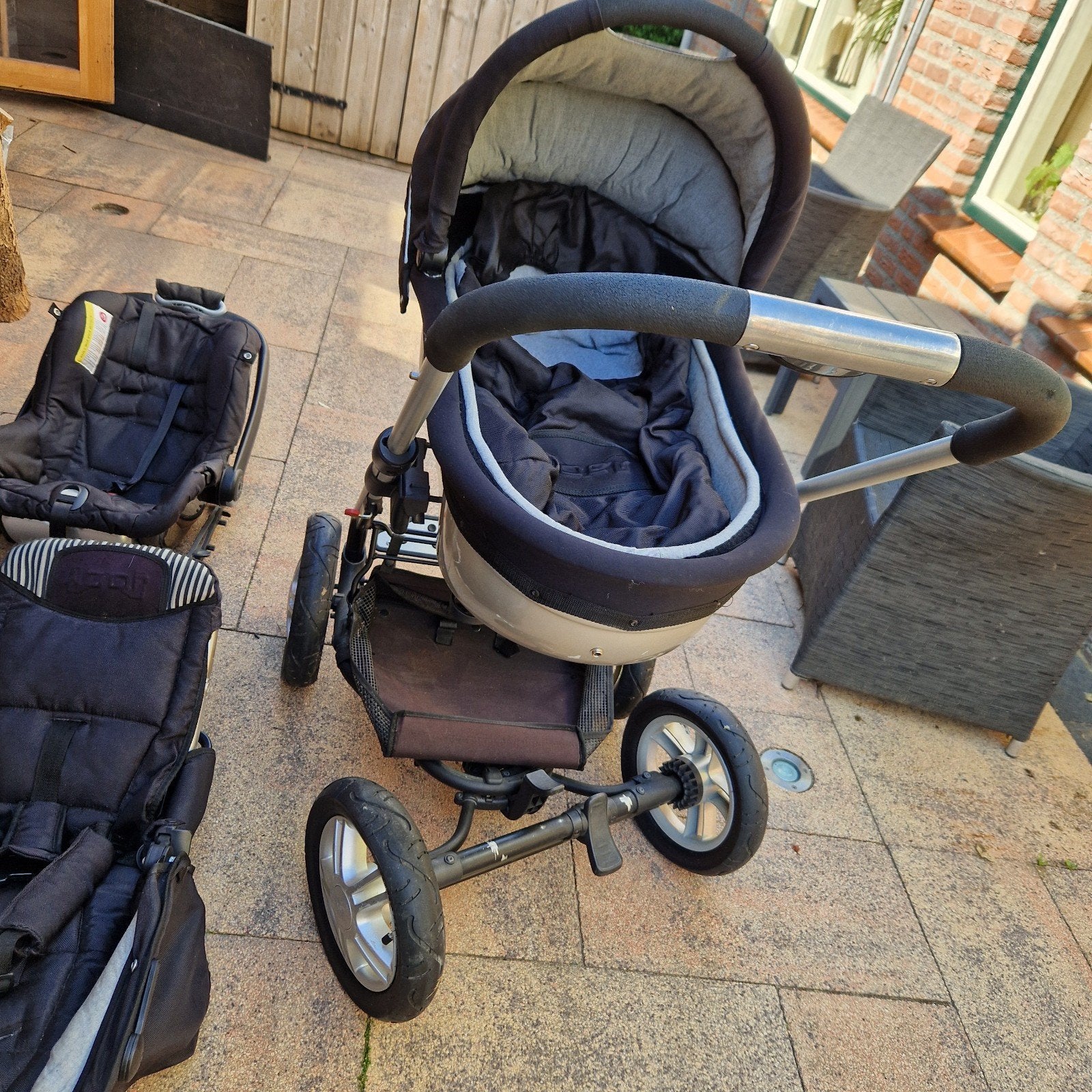 Mutsy 4-rider combiwagen met reiswieg, zitje en autostoel, Ophalen, Gebruikt, Verstelbare duwstang, Combiwagen