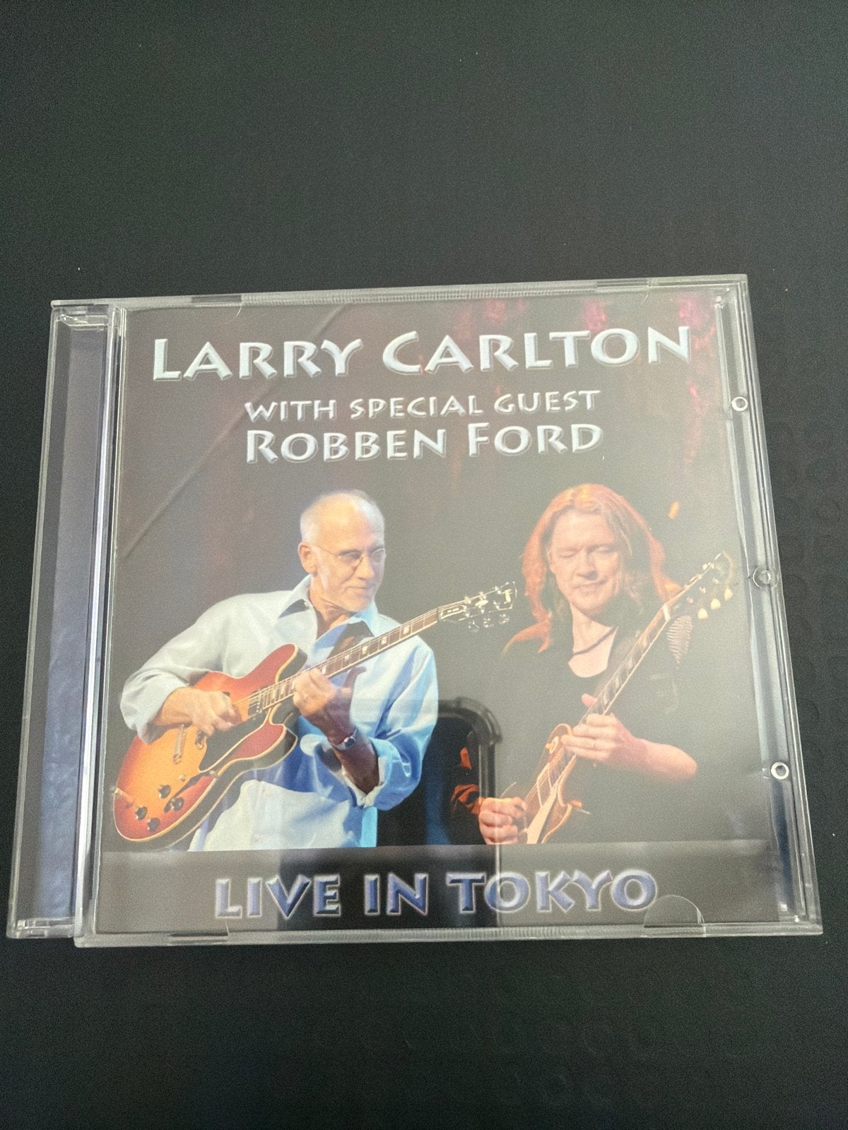 Larry Carlton & Robben Ford - Live In Tokyo CD, Cd's en Dvd's, Ophalen of Verzenden, Zo goed als nieuw, Live-album, Blues