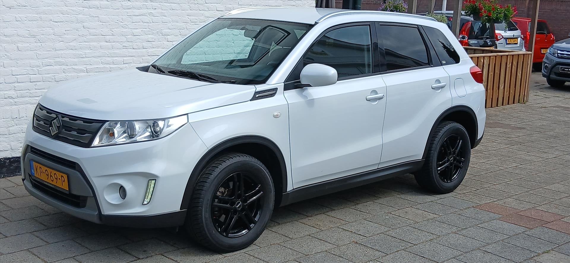 SUZUKI Vitara 1.6 vvt exclusive clima trekhaak nl auto, Auto's, Voorwielaandrijving, Lichtsensor, Stof, 4 cilinders
