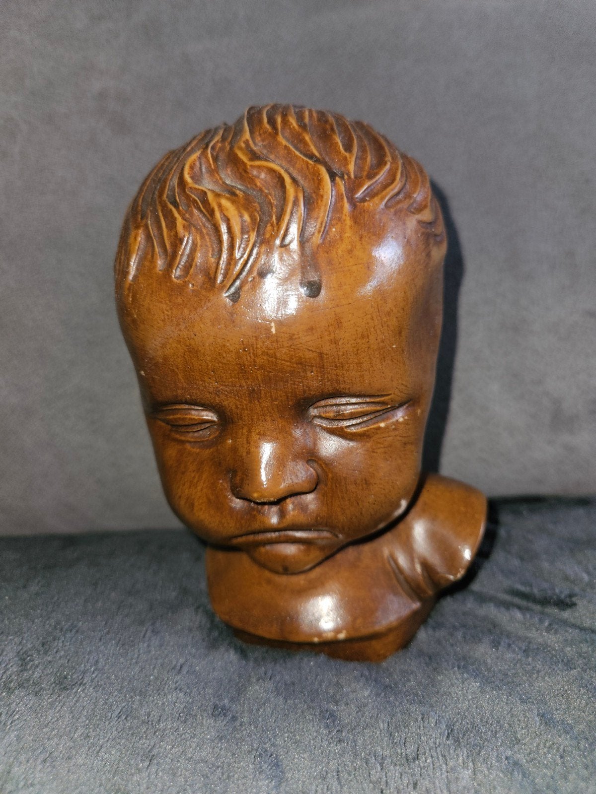 buste kinderhoofd, Ophalen