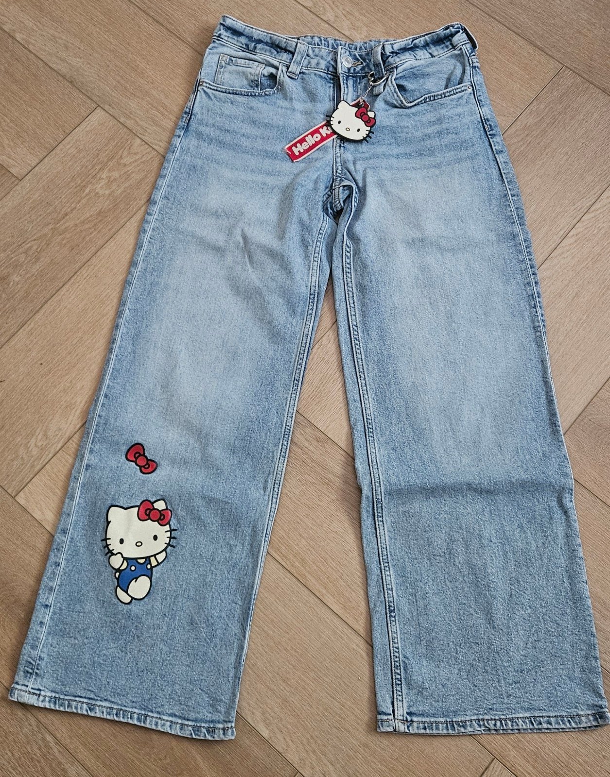 H&M Hello Kitty Loose Fit Jeans - Maat 152, Broek, Meisje, H&M, Ophalen of Verzenden