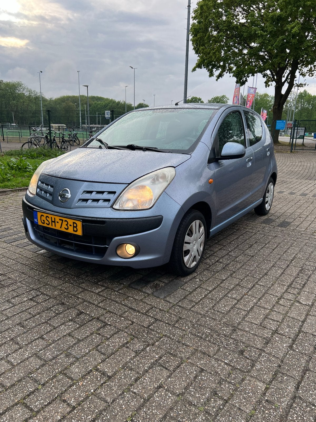 Nissan Pixo 1.0 50KW 5D 2009 Blauw, Auto's, Nissan, Voorwielaandrijving, 200 kg, Handgeschakeld, 3 cilinders