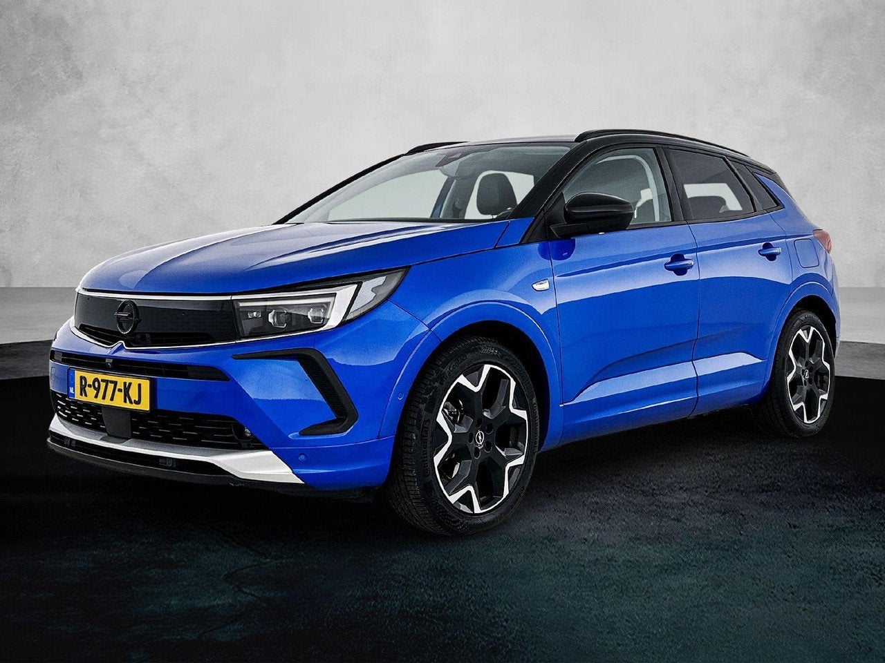 Opel Grandland 1.6 Turbo Plug-In Hybrid Ultimate 225pk Autom, Auto's, 77 km/l, 4 cilinders, Blauw, Bedrijf