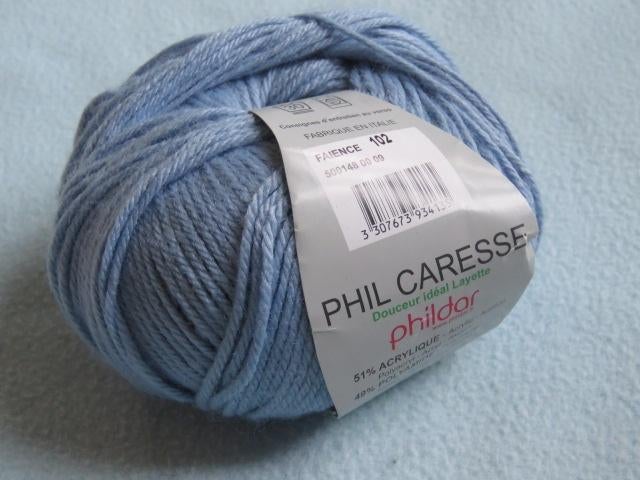 Nieuwe bol Phildar Phil Caresse lichtblauw 50 gram, Hobby en Vrije tijd, Ophalen of Verzenden, Nieuw, Breien of Haken, Wol of Garen