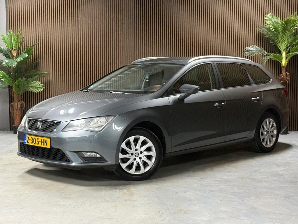 SEAT Leon ST 1.2 TSI St. First Ed (bj 2014, automaat), Auto's, Euro 5, Gebruikt, 4 cilinders, Leon