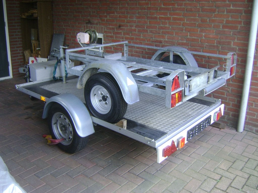 mooi torsie as 1400 kg ongeremd en trilplaat aanhanger, Ophalen, Gebruikt