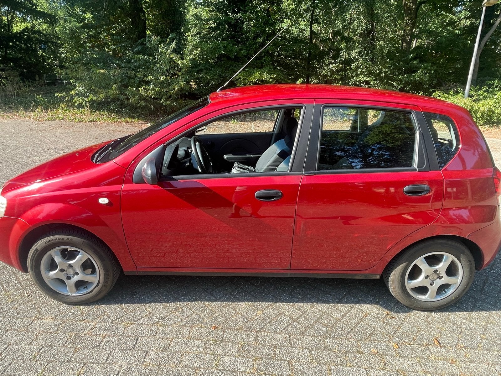 Chevrolet Kalos 1.2 5D 2006 Rood, Auto's, Chevrolet, Voorwielaandrijving, 1150 cc, 40 €/maand, 4 cilinders