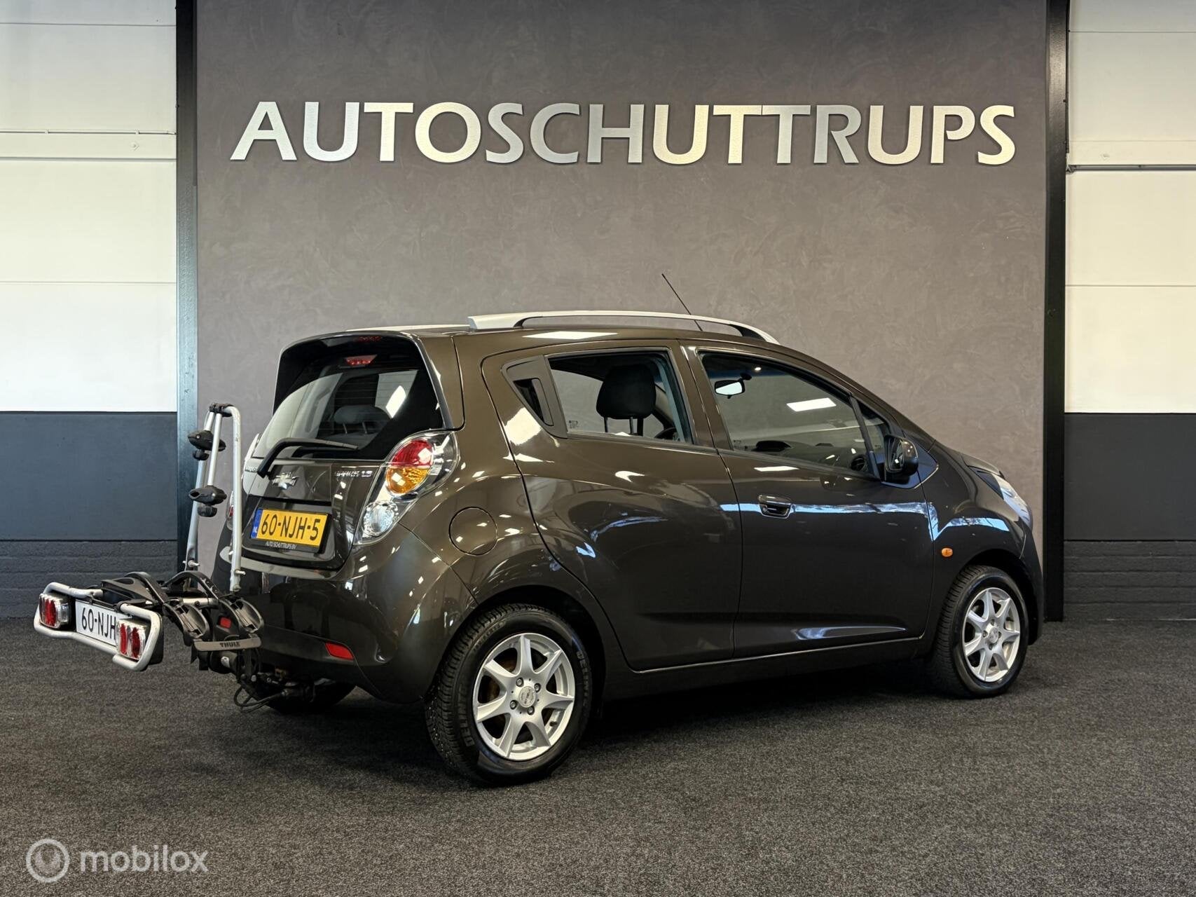 Chevrolet Spark 1.0 16V LS SLECHTS 64.000 KM NAP / AIRCO / G, Auto's, Voorwielaandrijving, Gebruikt, 4 cilinders, Bruin