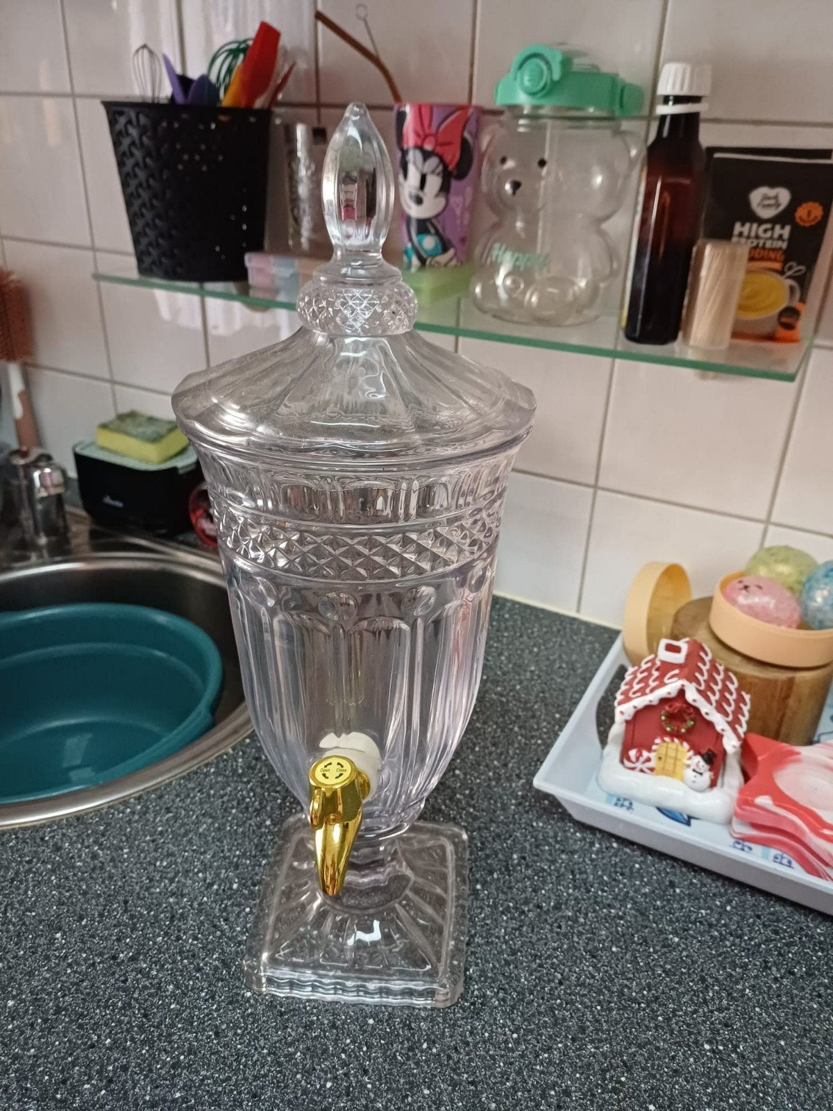 waterkan met kraantje, Ophalen