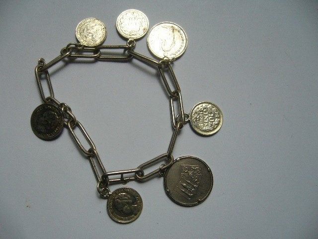 ANTIEKE MUNTENARMBAND GEMERKT AMERK. DOUBLE ZIE TEKST, Verzenden, Overige materialen, Armband