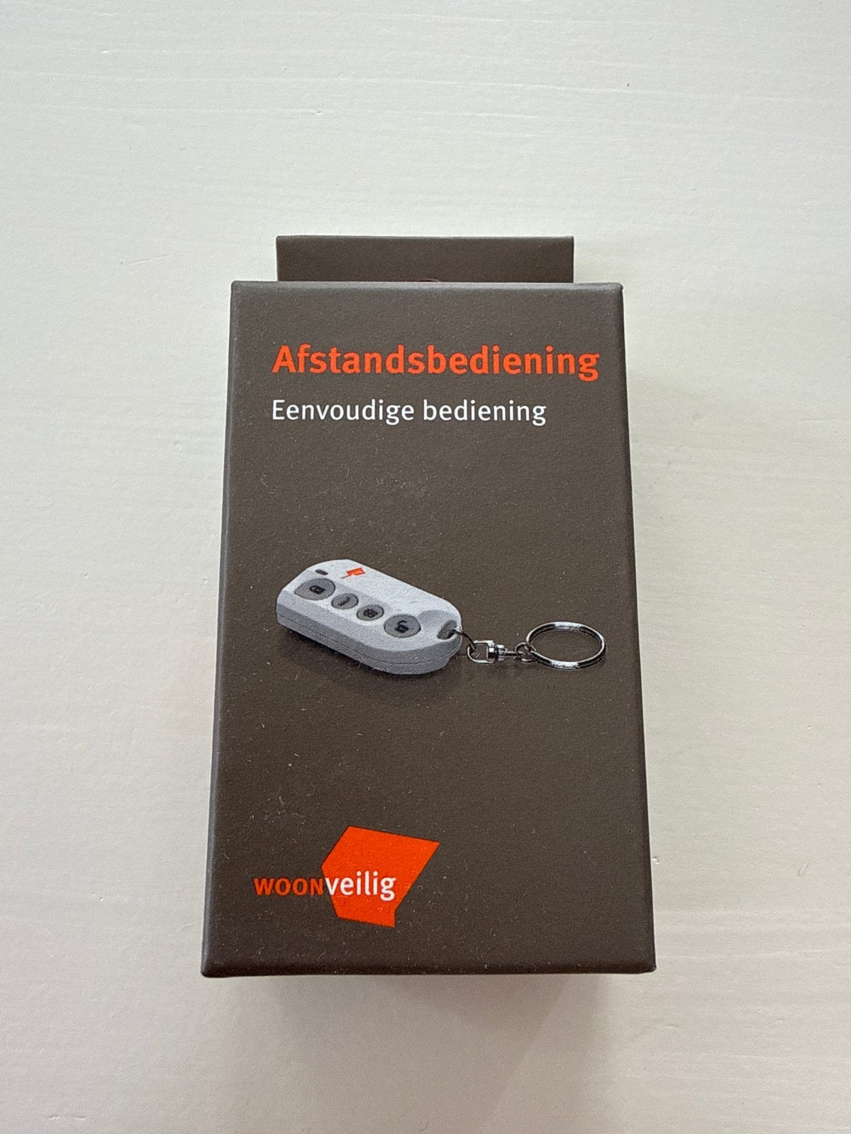 Woonveilig Afstandsbediening - Eenvoudige bediening, Nieuw, Ophalen of Verzenden, Compleet systeem, Afstandsbediening
