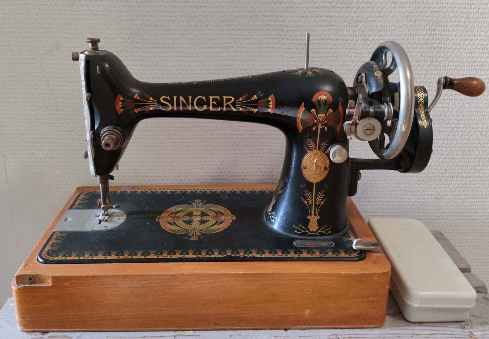 Singer hand naaimachine, Ophalen