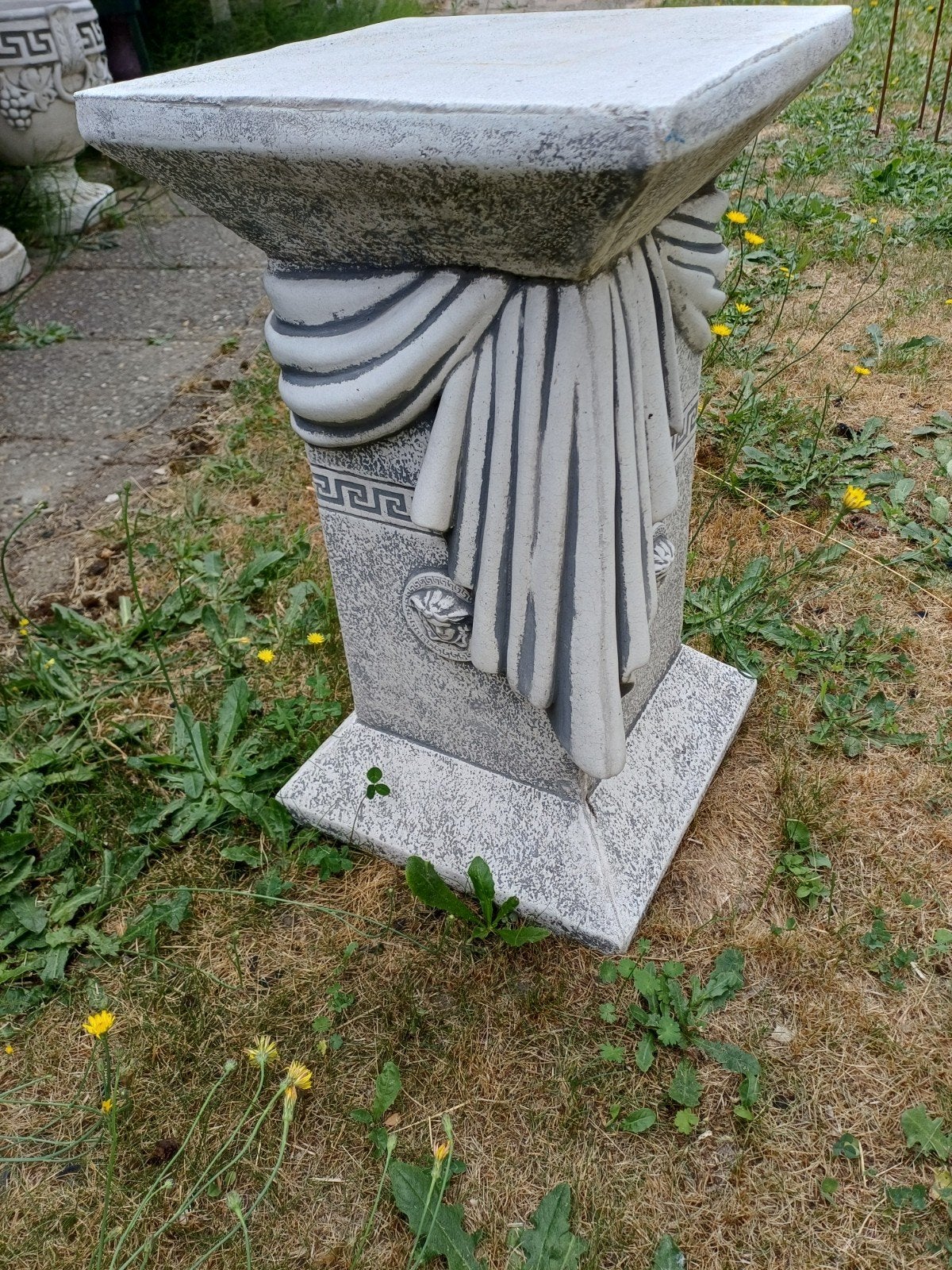 Betonnen tuinzuil, Ophalen