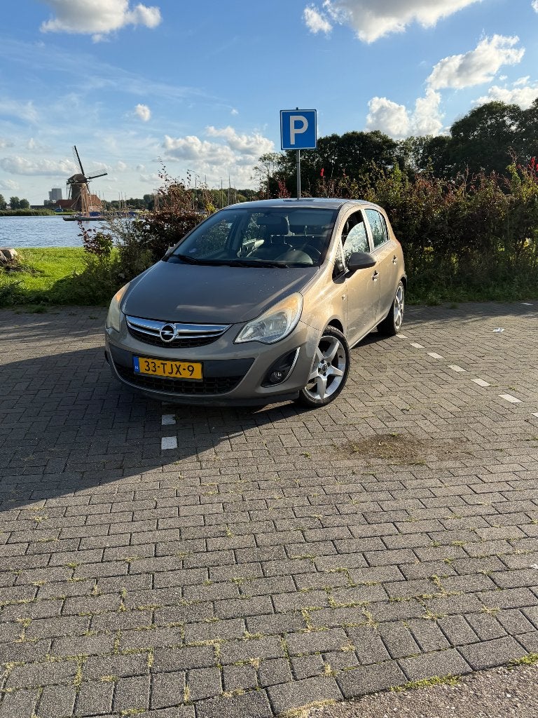 Opel Corsa 1.4 16V 5D 2012 Bruin, Voorwielaandrijving, 1063 kg, 1398 cc, 4 cilinders