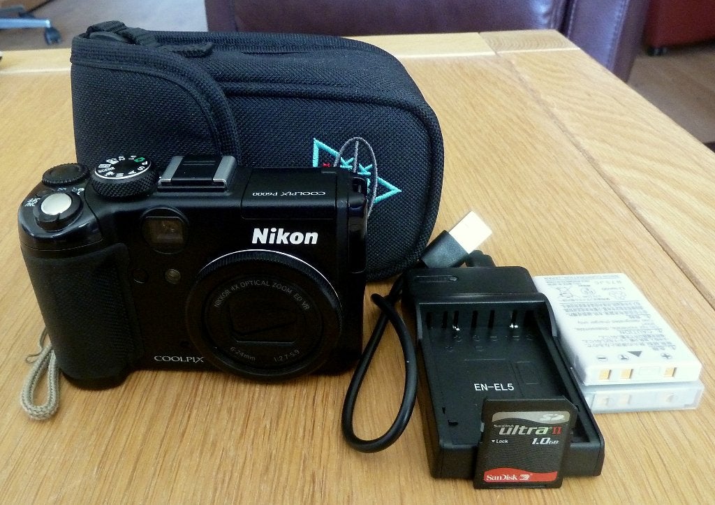 Nikon P6000 met Nikkor 2.7-5.9/28-112 mm ED-VR  Als Nieuw !!, Audio, Tv en Foto, Fotocamera's Digitaal, Ophalen of Verzenden, Zo goed als nieuw