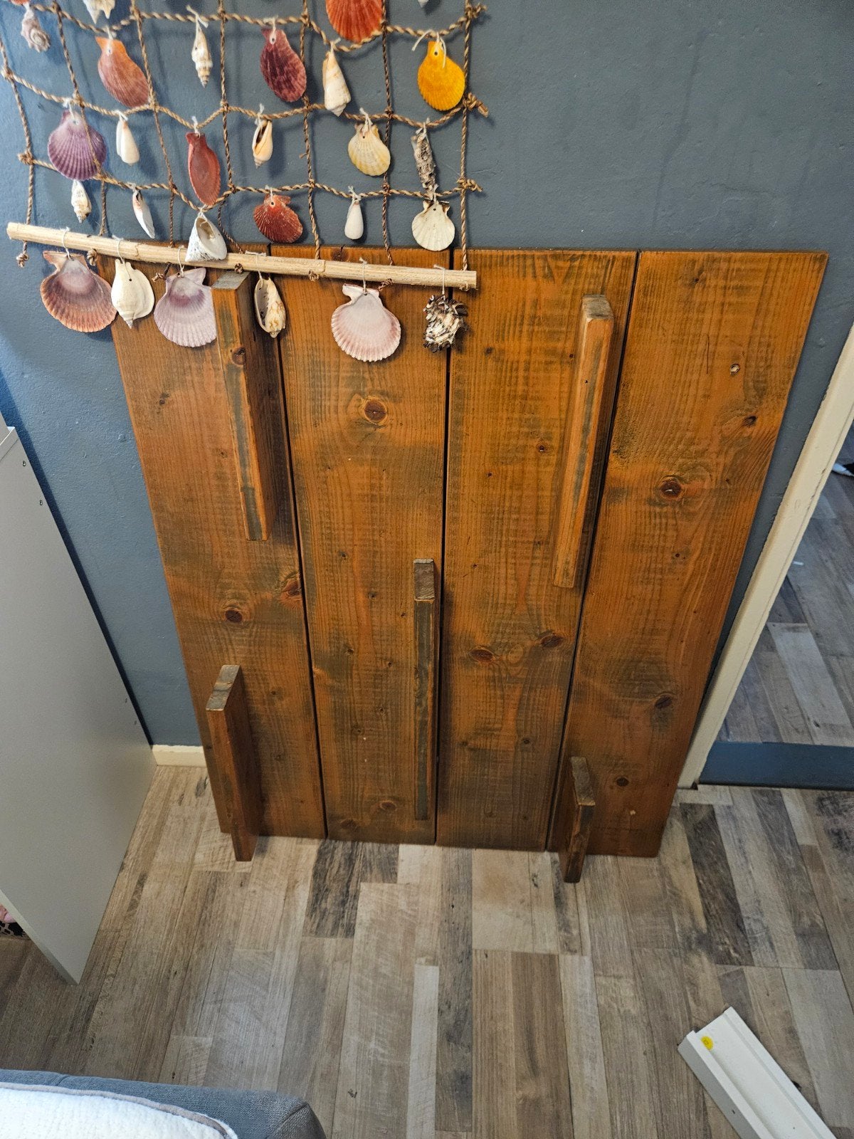 wandplank, Ophalen