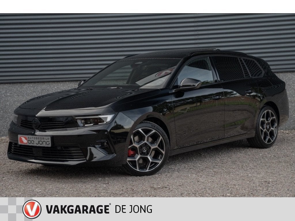 Opel Astra Sports Tourer 1.6 T PHEV Ultimate 180PK | Pano |, Auto's, 12 maanden, Gebruikt, 4 cilinders, Zwart