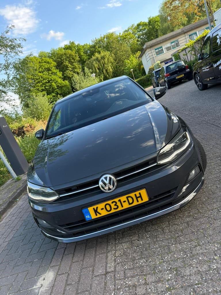 Volkswagen Polo 1.6 TDI 95pk 2018 Grijs, Voorwielaandrijving, Zwart, Leder en Stof, Particulier