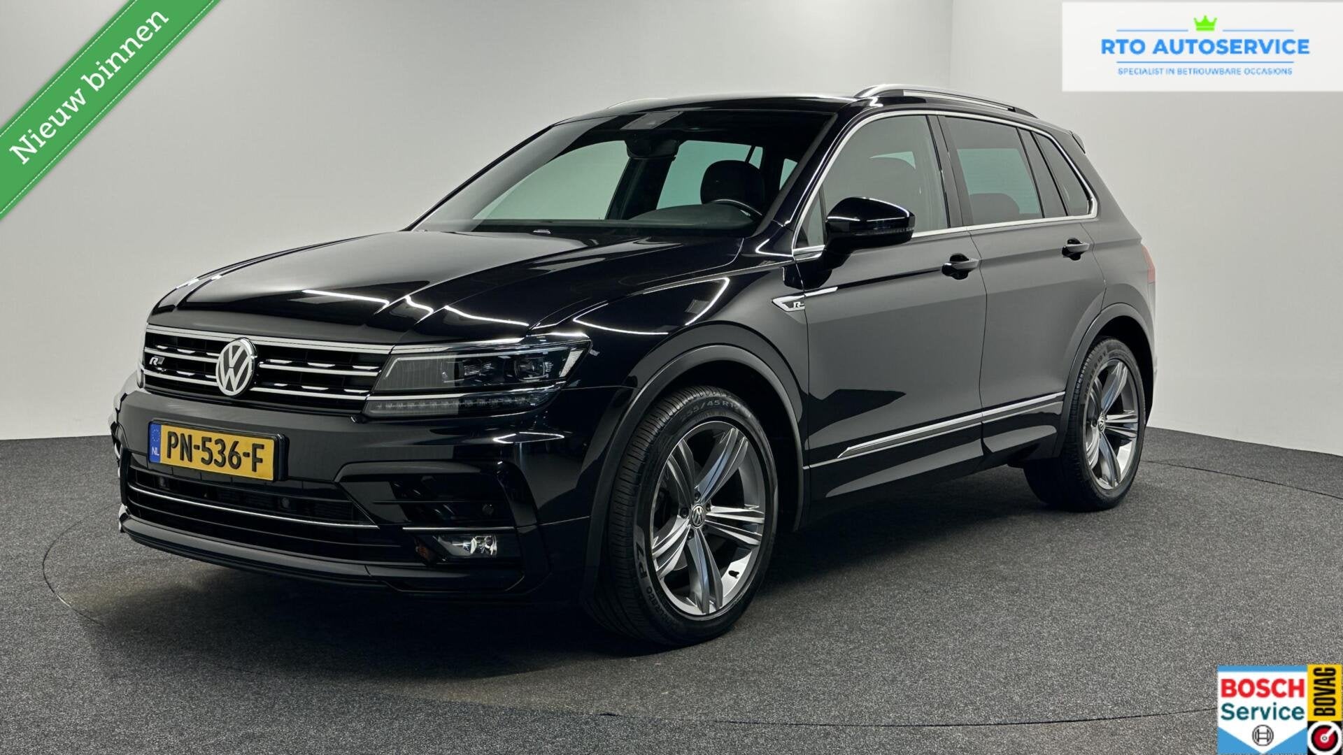 Volkswagen Tiguan 1.4 TSI ACT Comfortline Business R LEER CA, Voorwielaandrijving, 4 cilinders, Zwart, Handgeschakeld