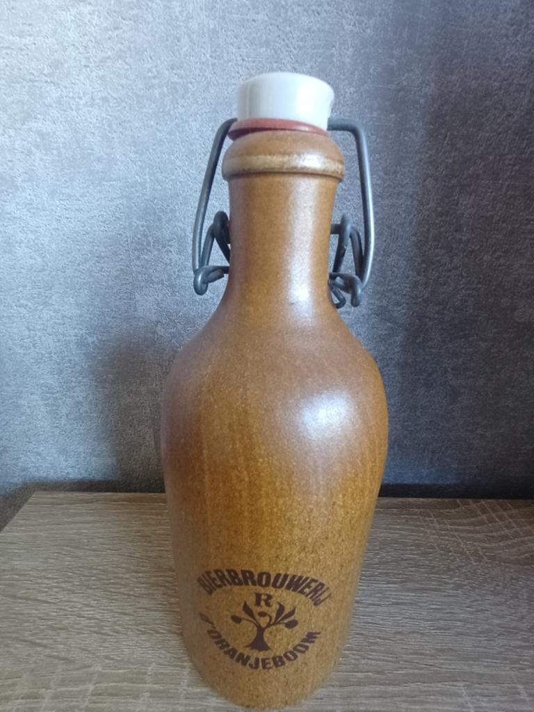 Vintage Bierbrouwerij Oranjeboom stenen fles met beugeldop, Verzamelen, Biermerken, Ophalen of Verzenden, Flesje(s), Overige merken