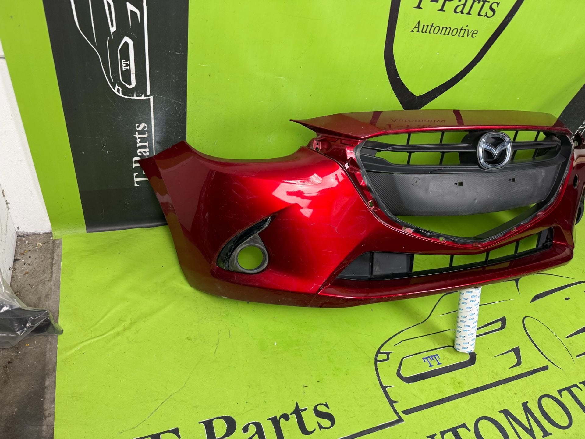 mazda 2 voorbumper bumper, Gebruikt, Shinchi, Fuchu-Cho 3-1
730-8670  Hiroshima, Mazda Motor Corporation, Info@mazda.co.jp