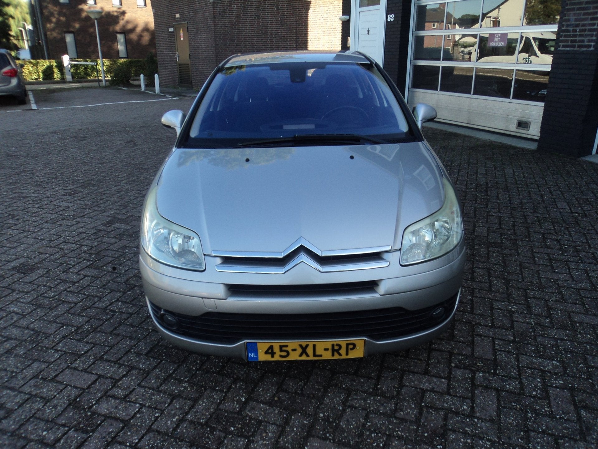Citroen C4 1.6-16V Ligne Ambiance Automaat, Stof, Gebruikt, Zwart, 4 cilinders