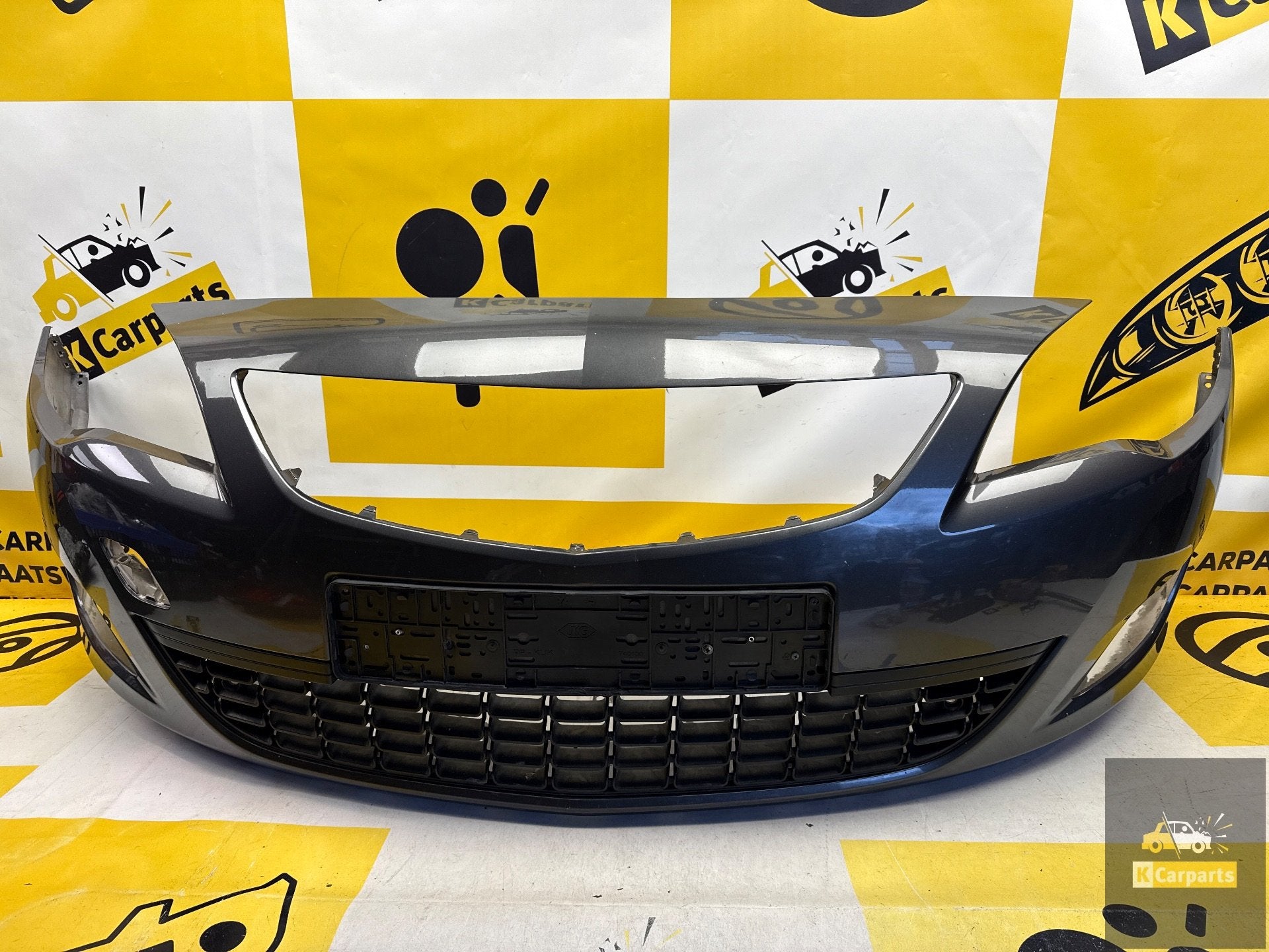Voorbumper Opel Astra J 2009-2015 13264403