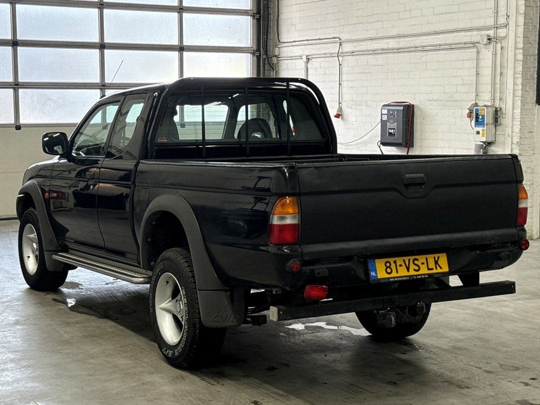 Mitsubishi L 200 2.5 Club Cab | 1e eigenaar | Trekhaak, Auto's, Gebruikt, 4 cilinders, 2477 cc, Zwart
