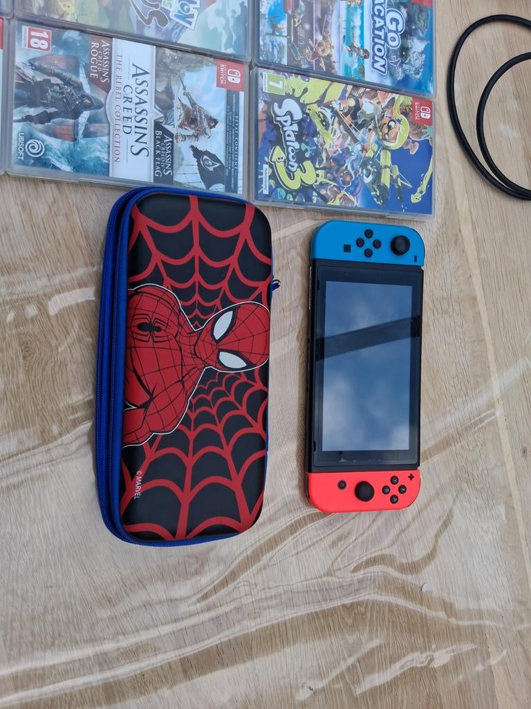 Nintendo Switch V2 met 12 games en accessoires en docking st, Spelcomputers en Games, Games | Nintendo Switch, Zo goed als nieuw