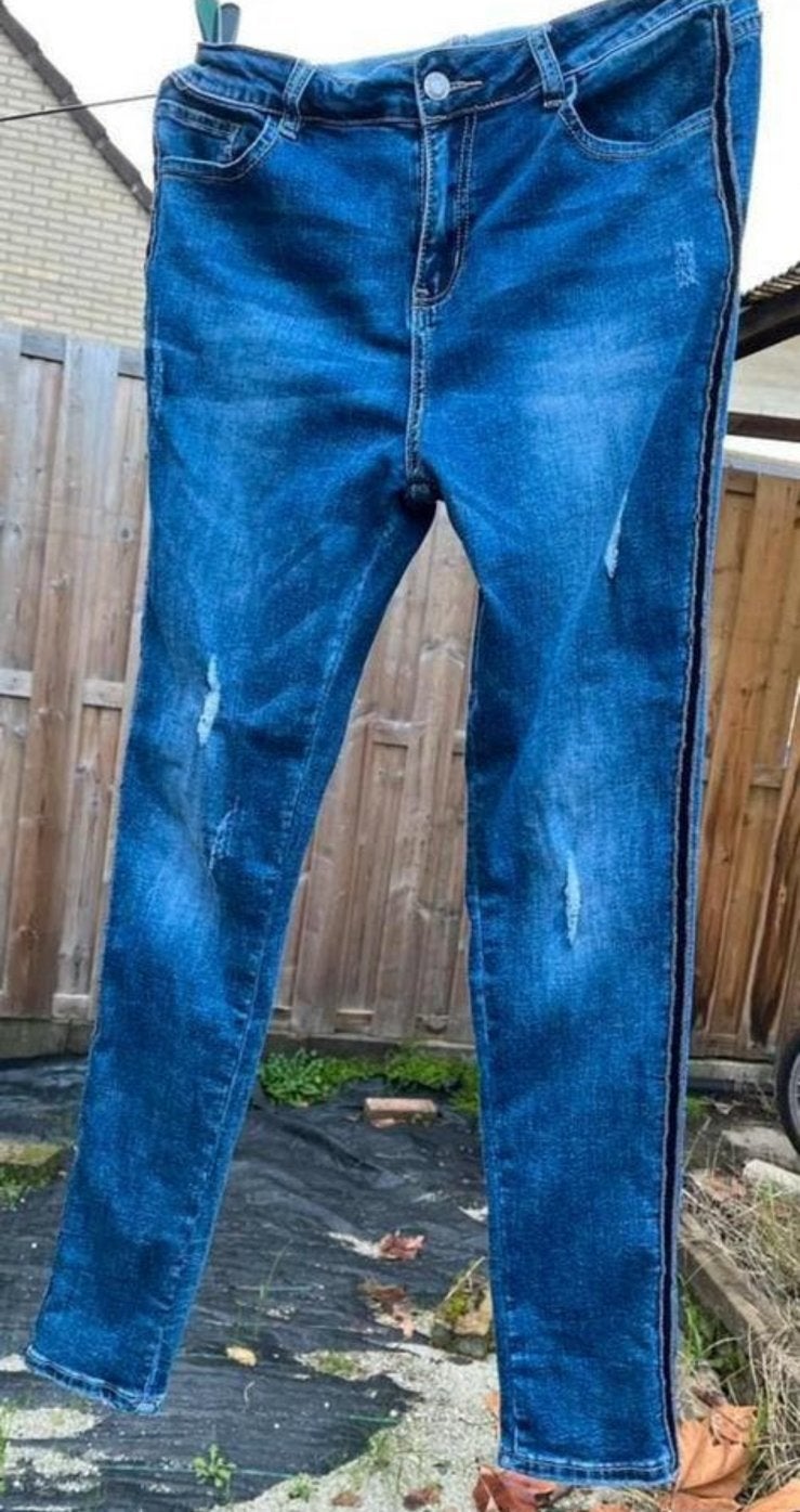 Blauwe ripped jeans van Monday Premium met bies maat 40., Ophalen of Verzenden, Gedragen, Blauw, W30 - W32 (confectie 38/40)