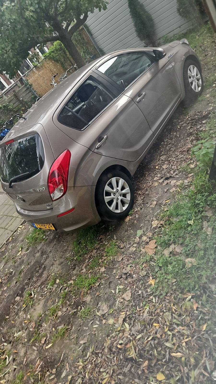 Hyundai i20 1.2I 5-DRS 2013 Bruin, Auto's, 4 cilinders, Bruin, Origineel Nederlands, Handgeschakeld