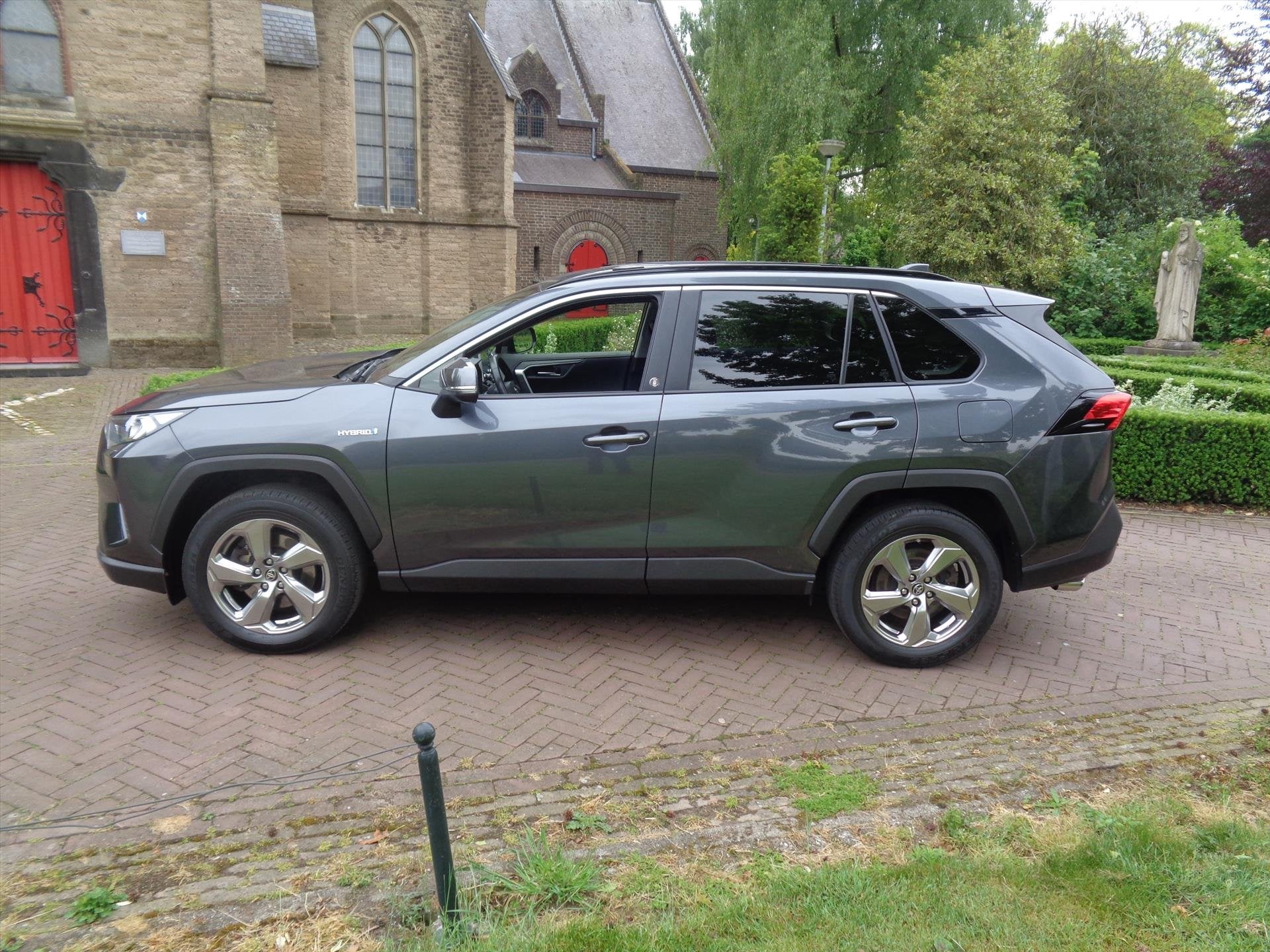 TOYOTA RAV4 2.5 Hybrid 222pk CVT AWD Dynamic bij Toyota spec, Auto's, Toyota, Automaat, 12 maanden, Stof, Gebruikt
