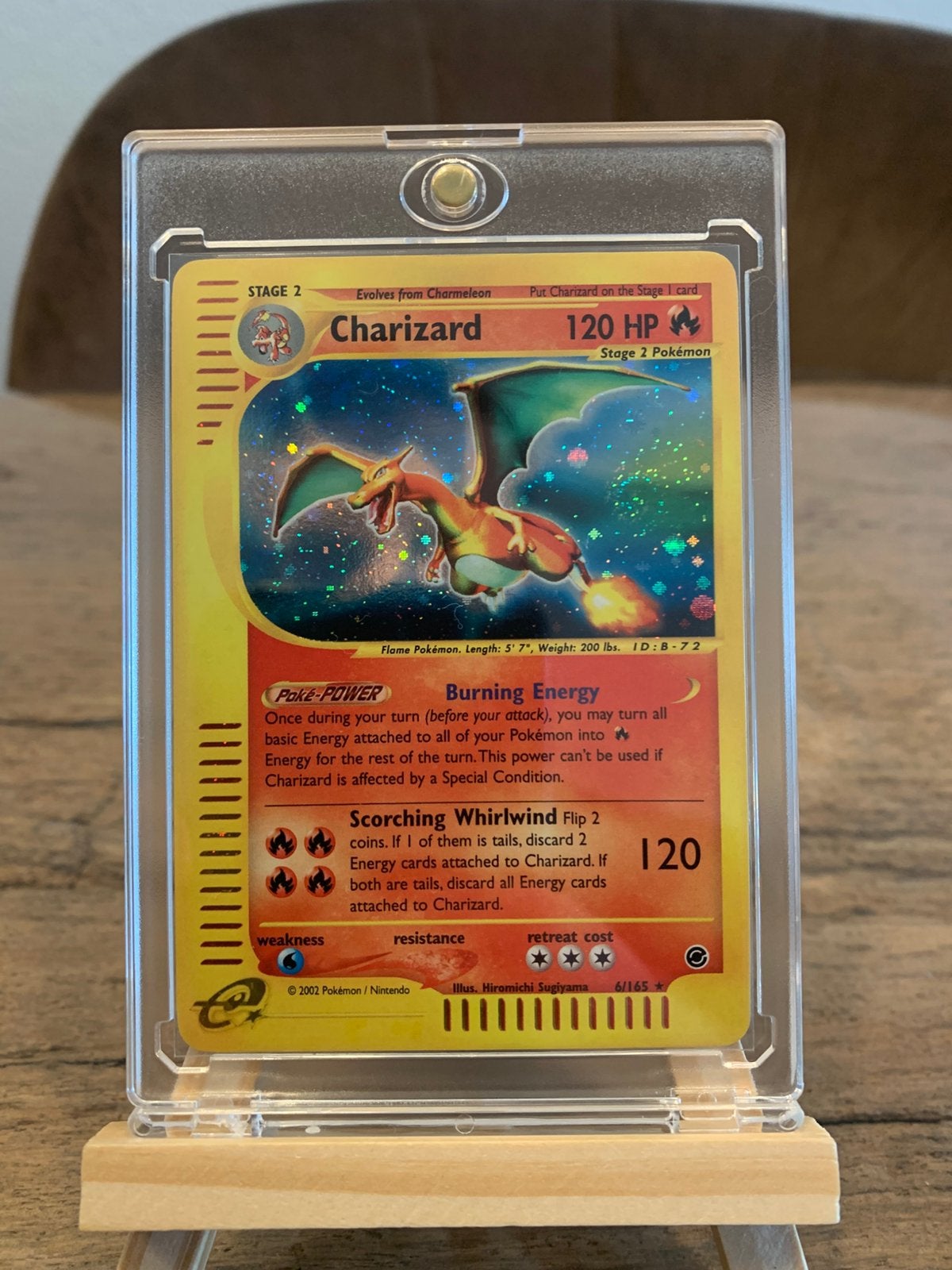 Charizard holo expedition swirl, Ophalen of Verzenden, Zo goed als nieuw