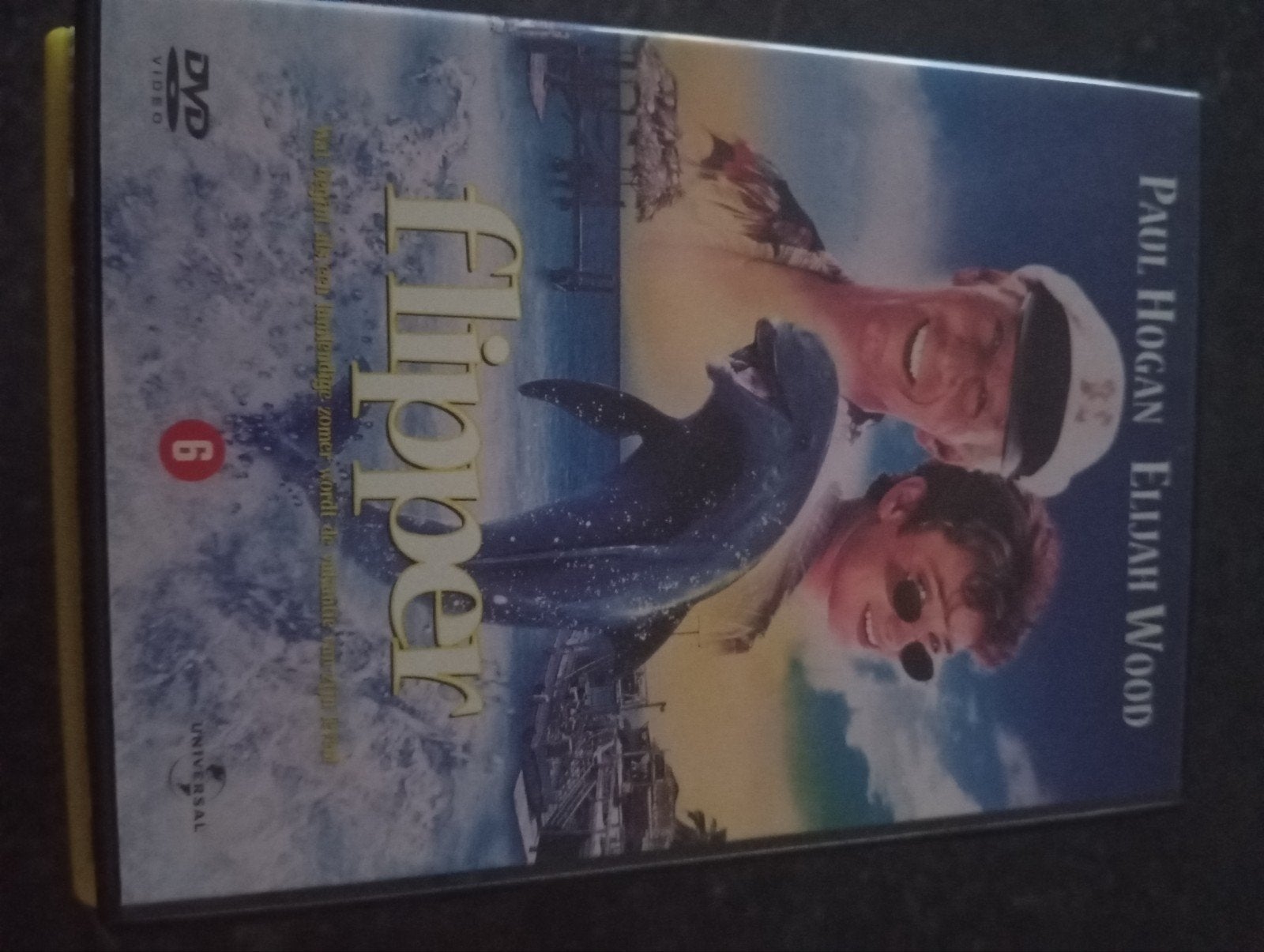 Flipper DVD - Paul Hogan, Elijah Wood, Vanaf 6 jaar, Ophalen of Verzenden, Gebruikt